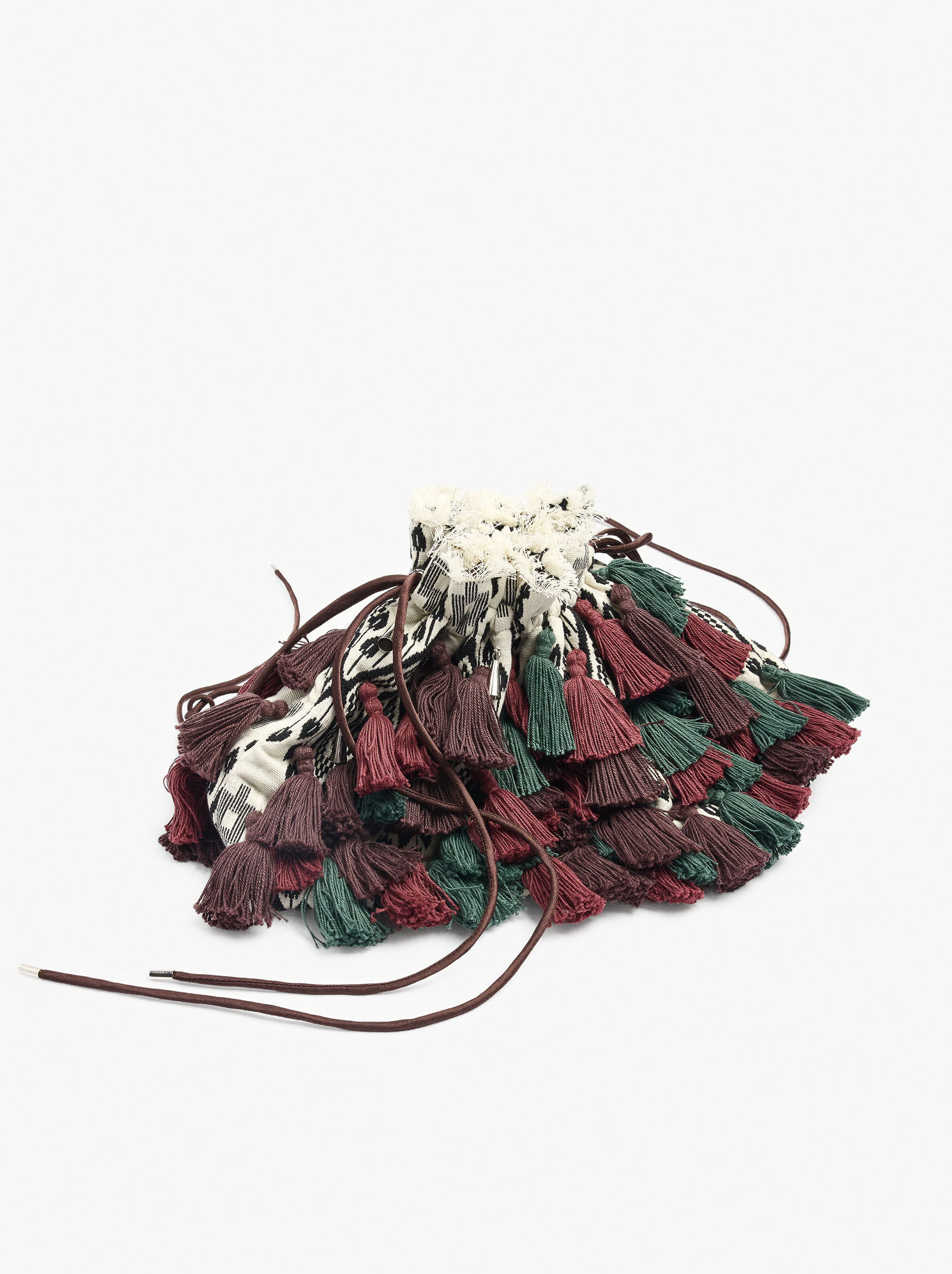 Bolso de fiesta de tela con borlas