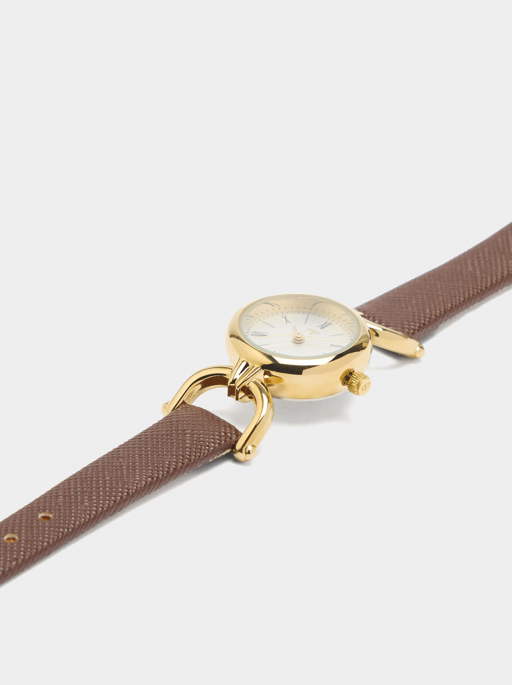 Reloj redondo con pulsera de textura
